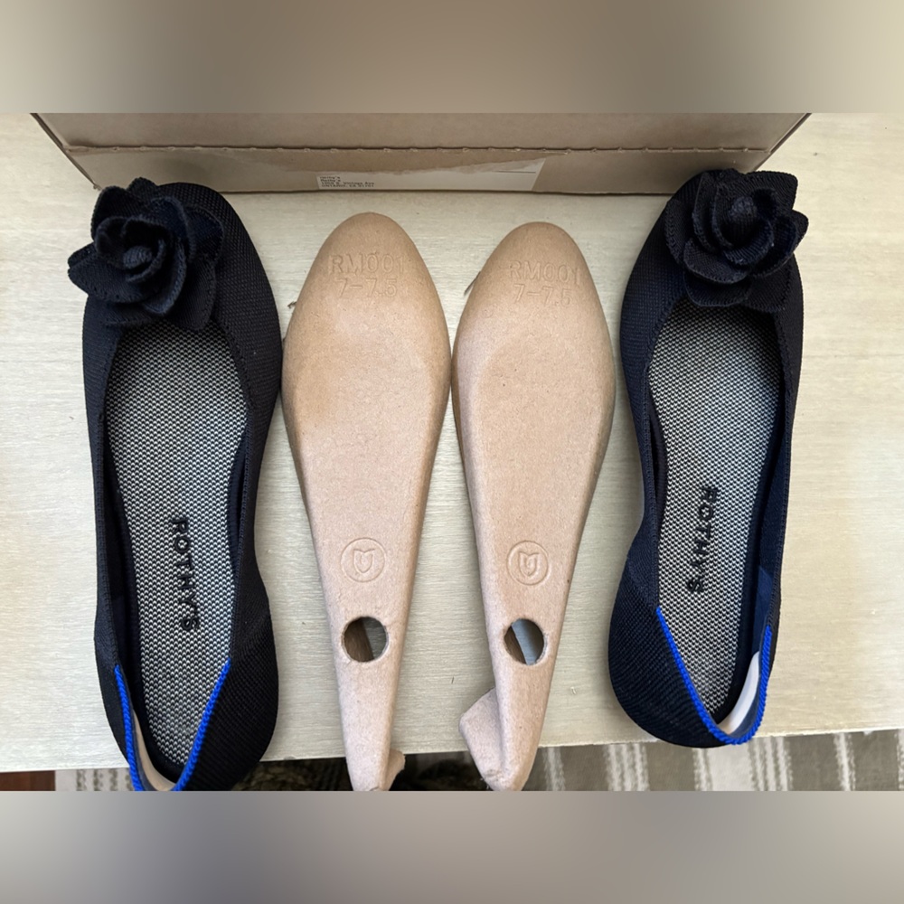 Rothy's Black Flats with Blue Accent and Floral Design